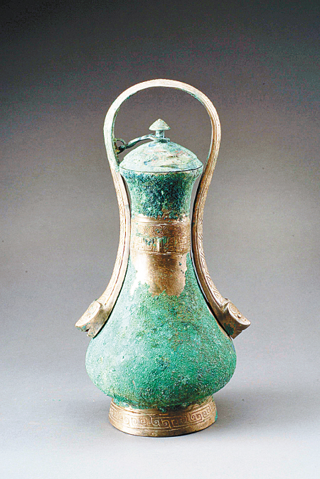 商代蛇首提梁青銅卣